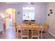 Light dining area with view of kitchen and stairs at 227 Verona Ave, Davenport, FL 33897