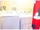 Laundry room with side-by-side washer and dryer at 227 Verona Ave, Davenport, FL 33897