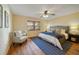Bedroom with natural light, ceiling fan, and wood-look flooring at 2626 S Atlantic Ave # 102, Daytona Beach Shores, FL 32118