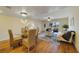 Bright living room with dining table and view of the backyard at 2626 S Atlantic Ave # 102, Daytona Beach Shores, FL 32118