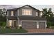 Two-story home with gray siding, two-car garage, and brick driveway at 2678 Great Heron Ave, St Cloud, FL 34773