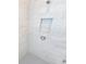 An updated shower featuring decorative tile and an adjustable shower head at 2678 Great Heron Ave, St Cloud, FL 34773