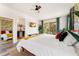 King bed, balcony access, stylish decor at 2735 Calabria N Ave, Davenport, FL 33897