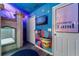 Themed bedroom with castle bunk bed and mural at 2735 Calabria N Ave, Davenport, FL 33897