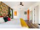 King-size bed and tropical-themed decor at 2735 Calabria N Ave, Davenport, FL 33897