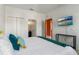 Main bedroom with a TV, ensuite bathroom, and ample closet space at 2735 Calabria N Ave, Davenport, FL 33897