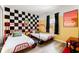 Bedroom with race car themed beds and decor at 2735 Calabria N Ave, Davenport, FL 33897