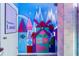 Hallway with playful mural and themed decor at 2735 Calabria N Ave, Davenport, FL 33897