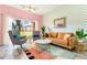 Living room features stylish furniture and access to a backyard at 2735 Calabria N Ave, Davenport, FL 33897