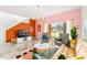 Spacious living area with a TV, comfortable seating, and access to backyard at 2735 Calabria N Ave, Davenport, FL 33897