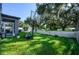 Spacious backyard with basketball court and large tree at 2775 Red Horse Dr, Kissimmee, FL 34744