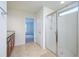 Bathroom with double vanity, shower, and access to another room at 2775 Red Horse Dr, Kissimmee, FL 34744
