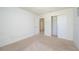Bright bedroom with carpet flooring and spacious closet at 2775 Red Horse Dr, Kissimmee, FL 34744