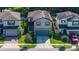Two story home with gray siding and solar panels at 2775 Red Horse Dr, Kissimmee, FL 34744