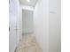 Clean and bright hallway with tile flooring at 2775 Red Horse Dr, Kissimmee, FL 34744