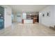 Open kitchen features an island and breakfast bar at 2775 Red Horse Dr, Kissimmee, FL 34744