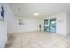 Bright living room with tile floors and sliding doors at 2775 Red Horse Dr, Kissimmee, FL 34744
