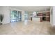 Open living room and kitchen area with tile floors at 2775 Red Horse Dr, Kissimmee, FL 34744