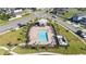 Community pool with lounge chairs and gazebo at 2775 Red Horse Dr, Kissimmee, FL 34744