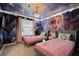 bedroom with Frozen mural and twin beds at 3083 Mahalo Dr, Davenport, FL 33897