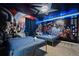 Bedroom with an Avengers-themed mural and twin beds at 3083 Mahalo Dr, Davenport, FL 33897