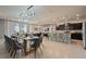 Open concept dining room with large table and seating for many at 3083 Mahalo Dr, Davenport, FL 33897