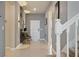 Bright and spacious entryway with clean lines and modern decor at 3083 Mahalo Dr, Davenport, FL 33897