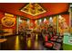 Game room with foosball, pool table, and Mario Bros wall art at 3083 Mahalo Dr, Davenport, FL 33897