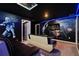 Star Wars themed theater room with seating at 3083 Mahalo Dr, Davenport, FL 33897