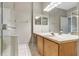 Bathroom with double vanity and glass shower at 3237 River Branch, Kissimmee, FL 34741
