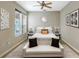 Comfortable bedroom featuring ample natural light, a ceiling fan, and neutral decor at 3237 River Branch, Kissimmee, FL 34741