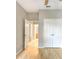 Bedroom with wood flooring, double doors to a closet, and a view of a bath at 3237 River Branch, Kissimmee, FL 34741
