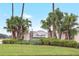 Stonefield community entrance with lush landscaping and signage at 3237 River Branch, Kissimmee, FL 34741