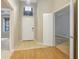 Light and airy foyer with tile and wood flooring at 3237 River Branch, Kissimmee, FL 34741