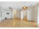 Large living area with hardwood floors and multiple access points at 3237 River Branch, Kissimmee, FL 34741