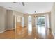Spacious living room featuring hardwood floors and an open floor plan at 3237 River Branch, Kissimmee, FL 34741
