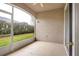 Screened-in porch offers an outdoor space with backyard access at 3237 River Branch, Kissimmee, FL 34741