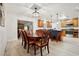 Open concept dining area with kitchen and living room views at 349 Hickory Dr, Maitland, FL 32751