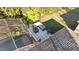 View of backyard patio with seating area and screened enclosure at 493 Carey Way, Orlando, FL 32825