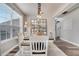 Bright dining room featuring a farmhouse table and stylish lighting at 493 Carey Way, Orlando, FL 32825