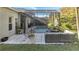 Relaxing patio with wicker furniture near a refreshing pool at 493 Carey Way, Orlando, FL 32825