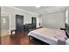 Bright bedroom with hardwood floors and en-suite bathroom access at 5127 Appenine W Loop, Saint Cloud, FL 34771