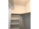 White closet with shelving and hanging rod at 6039 Village Cir # Bldg C, Orlando, FL 32822
