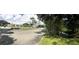 Serene community with walking paths and lush greenery at 6039 Village Cir # Bldg C, Orlando, FL 32822