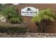 Condo community entrance sign at 6039 Village Cir # Bldg C, Orlando, FL 32822