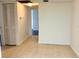 Hallway with tile floors and linen closet at 6039 Village Cir # Bldg C, Orlando, FL 32822