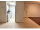 Efficient kitchen features white appliances and ample cabinetry at 6039 Village Cir # Bldg C, Orlando, FL 32822