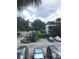 View of the apartment building's parking lot at 6039 Village Cir # Bldg C, Orlando, FL 32822