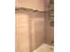 Bathroom shower with neutral tile at 6039 Village Cir # Bldg C, Orlando, FL 32822