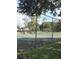 Well-maintained tennis court within a gated community at 6039 Village Cir # Bldg C, Orlando, FL 32822